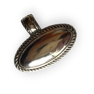 Heavy silver tone magnetic closure statement pendant